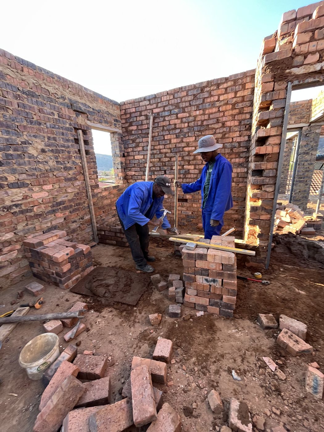 Gebisa Projects bricklayers building interior walls
