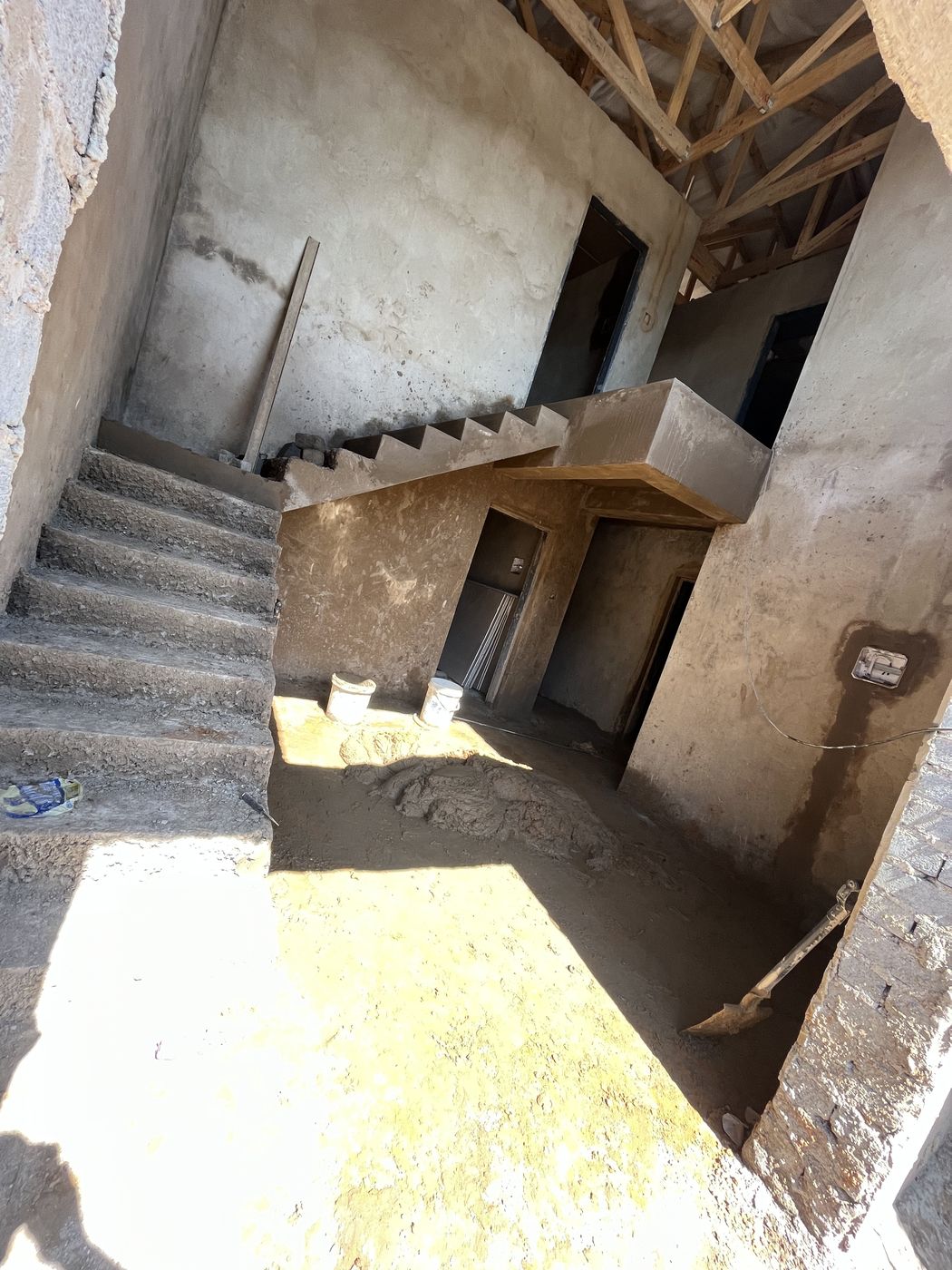 Aerial view of a near-complete double-storey house built by Gebisa Projects
